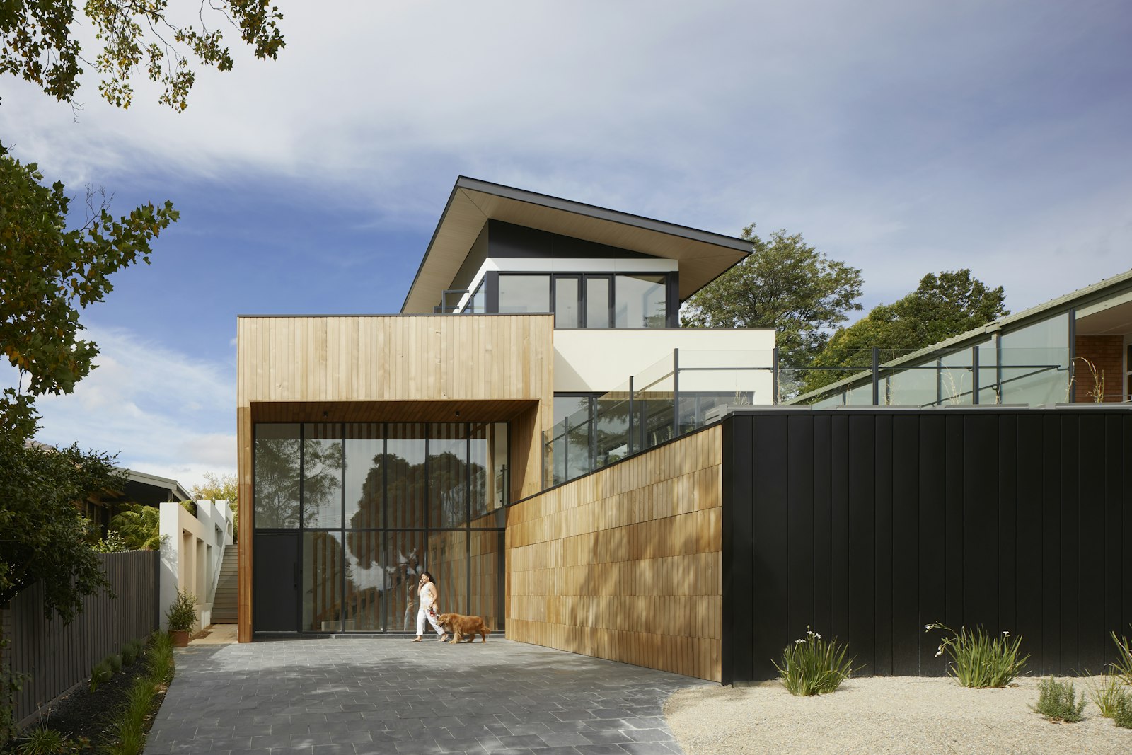 Contemporary timber and black-clad house exterior